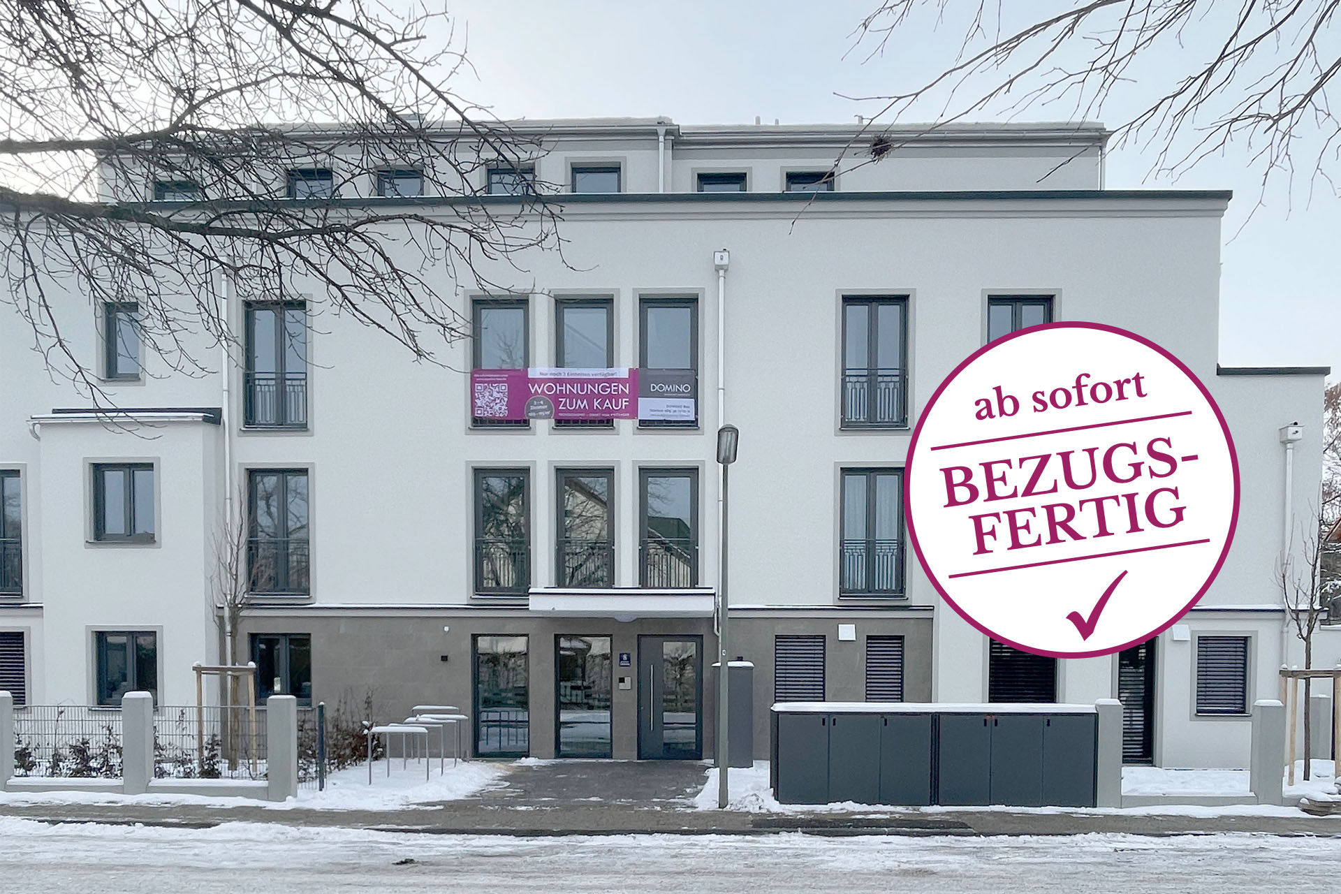 Ansicht eines sofort bezugsfertigen Mehrfamilienhauses mit Tiefgarage von DOMINO Bau in München Denning