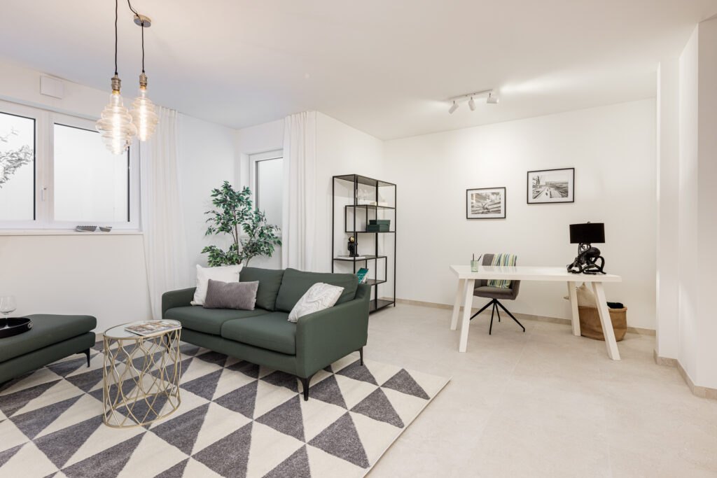 Foto eines Hobbyraums im Untergeschoss einer bezugsfertigen Neubauwohnung in Trudering von Domino Bau