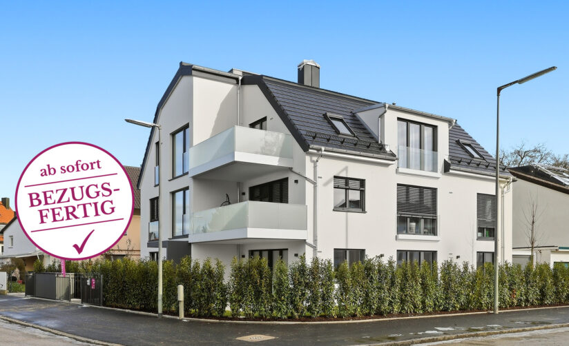 Foto eines Neubau Mehrfamilienhauses mit drei Wohnungen von DOMINO Bau in München Solln