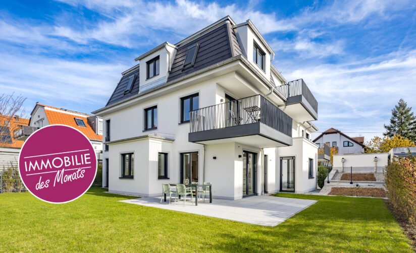 Foto einer Terrasse mit Garten im Erdgeschoss einer bezugsfertigen Neubauwohnung in Trudering von Domino Bau